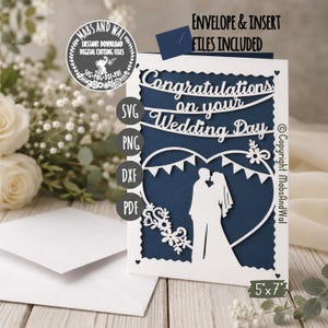 May include: A white laser-cut wedding card with a navy blue insert. The card features the text "Congratulations on your Wedding Day" and a silhouette of a couple. The card is 5"x7" and includes an envelope.