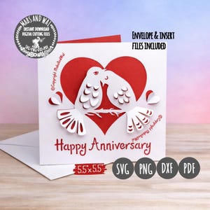 May include: A white and red paper anniversary card featuring two kissing doves inside a red heart. The card reads "Happy Anniversary" and includes the text "Envelope & Insert Files Included". The card measures 5.5 x 5.5 inches.