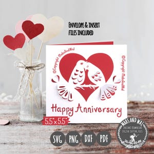 May include: A white and red anniversary card with a heart design and two doves kissing. The card reads "Happy Anniversary" and is 5.5 x 5.5 inches. The image also includes heart-shaped decorations and the text "Envelope & Insert Files Included."