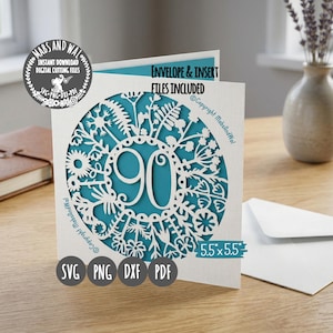 May include: A white, laser-cut card with a teal insert, featuring a floral design around the number 90. The card is 5.5" x 5.5" and includes SVG, PNG, DXF, and PDF files. Text on the card reads "Envelope & Insert Files Included."