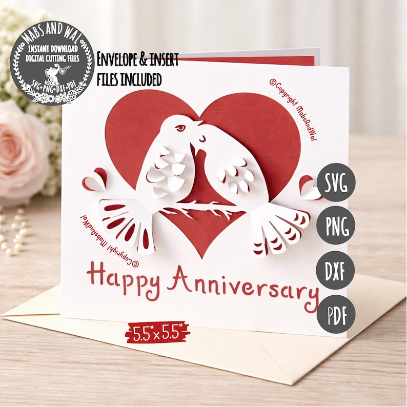 May include: A white and red anniversary card with a heart and two doves kissing. The card reads "Happy Anniversary" and includes the text "Envelope & Insert Files Included". The card measures 5.5" x 5.5".