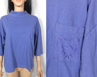 Vintage 80s/90s Pastel Purple Cropped Mockneck Embroidered Crest Pocket All Cotton Tee Made In USA Size L