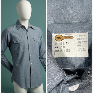 May include: A blue long-sleeve button-down shirt with two chest pockets. The interior label reads: Key Imperial Since 1903, Lot 516.45, Neck 15 1/2, Sleeve 35 Long, RN#17754, Made in U.S.A., 100% Cotton, BD#50-278. The shirt features a classic collar.