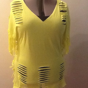 yellow cut up t shirt with side tie up and tasseled sleeves