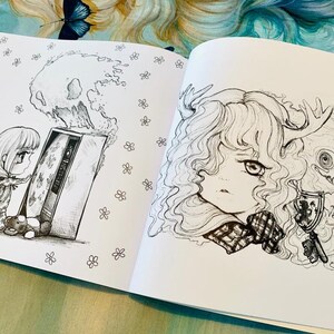 May include: A black and white colouring book page featuring two illustrations. The first illustration is of a young girl with long hair looking at a television with a skull-shaped cloud above it. The second illustration is of a girl with long hair and a creature with antlers and a toothy grin.