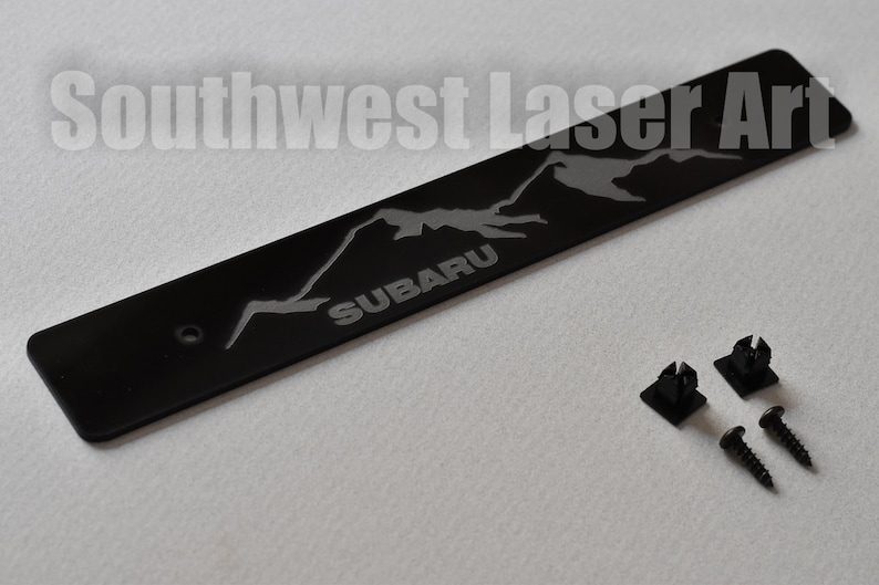 Laser cut and engraved acrylic front license plate deletes for 2008-2014 Subaru WRX STI and Impreza