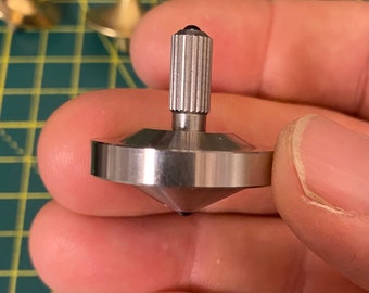 Solid steel medium spinning top