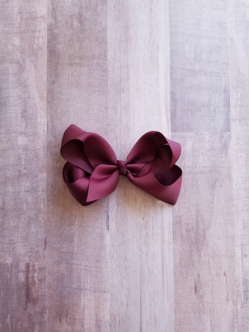 handmade burgandy and gold stars hair bow