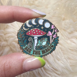 See the Magic Nature Pin - Frog, Mushroom, Moon Phases & Plants! Glow in the Dark Enamel Pin! Cottagecore - Wildflower + Co.
