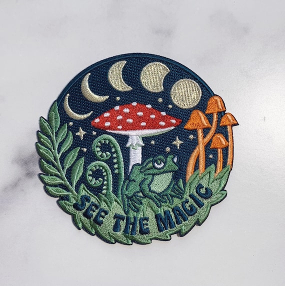 See the Magic Nature Patch - Frog, Mushroom, Moon Phases & Plants!  Iron On Embroidered Patch for Jackets + Cottagecore - Wildflower + Co.