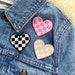 see more listings in the PATCHES + PINS section