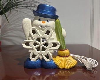 8.5" Lighted Snowman with green broom and blue hat. Night Light. Handmade in the USA