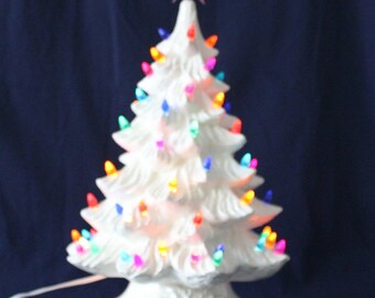 19" White Ceramic Christmas Tree with multicolored lights: Lighted Tabletop Decoration