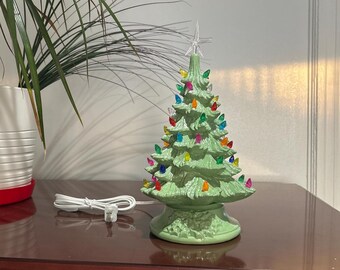 11 inch Ceramic Christmas Tree lighted:  painted Sage Green with Multicolored lights