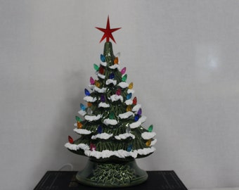 11" Ceramic Christmas Tree, lighted Christmas tree, green glazed tree with multi colored lights and snow,  free shipping in the lower 48.