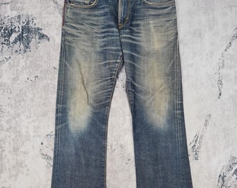 Vintage Edwin Blue Trip bootcut flare jeans Edwin Blue Trip vervaagde spijkerbroek met stone wash 35 x 30,5 JB0168