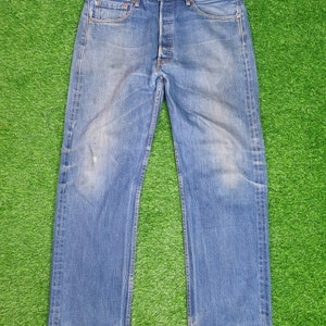 Vintage  Levi’s 501 Sun Faded Medium Wash Ripped Levis 501 Blue Jeans Levis Faded Grunge Punk Pant Size 34X31 Jeans L0063