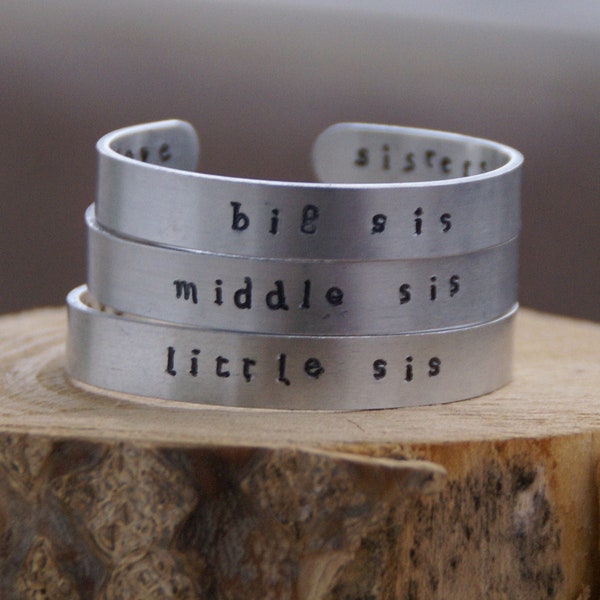 Set of two or three sisters'  love bangles with your initial letters.