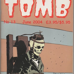 Puede incluir: Una portada de cómic con un esqueleto en una silla eléctrica. La portada se titula "From the Tomb" y el número de la edición es 13. La fecha de publicación es junio de 2004 y el precio es de 3,95 £/5,95 $.