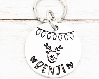 Huisdierpenning met kerstrendier, hondenpenning met kerstmotief, huisdierbedeltje met kerstversiering, naamplaatjes voor honden, naamplaatje voor katten, hondenbedeltje met kerstverlichting, nieuwe hond