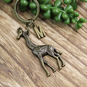 Louis Vuitton Limited Edition Giraffe Keychain Charm at 1stDibs  lv  giraffe keychain, louis vuitton giraffe keychain, giraffe key chain