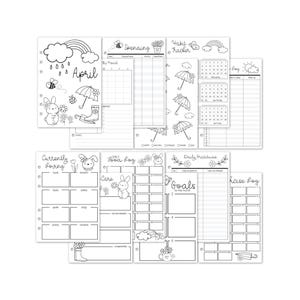 May include: A set of undated planner inserts with spring-themed illustrations. The inserts include pages for April, spending, habit tracking, daily logs, and goal setting. The designs feature bunnies, umbrellas, rainbows, and flowers.
