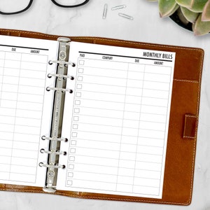 Two A5 printed monthly bill tracker pages side by side on a white background, showing columns for Paid, Company, Due Date, and Amount. Clean minimalist layout for tracking monthly bills. Physical paper insert only, binder not included. Made in the USA by CityGirl Planners.