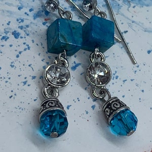 turquoise blue, rhine stone and silver slim long dangle earrings.