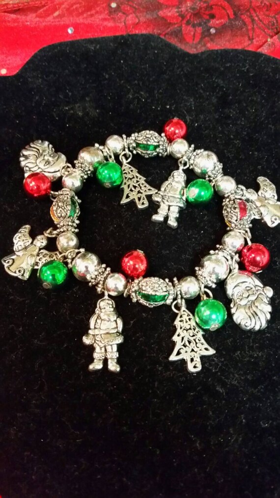 Items similar to Silver Charm Christmas Bracelet with Silver Santa's ...