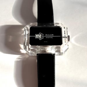 Buler jump-hour Plexiglass woman's wrist watch. Produced in the 1970's in Switzerland