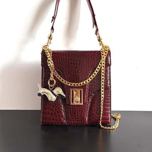 Bolso de cocodrilo muy especial de los años 70 en muy buen estado.