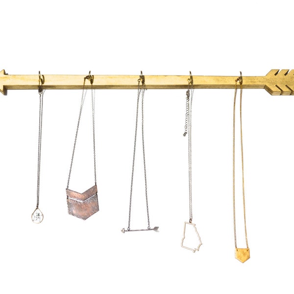 Gold arrow jewelry holder