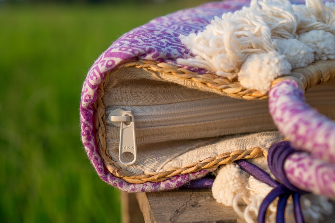 purple straw bag