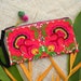 see more listings in the Clutches & Wristlets section