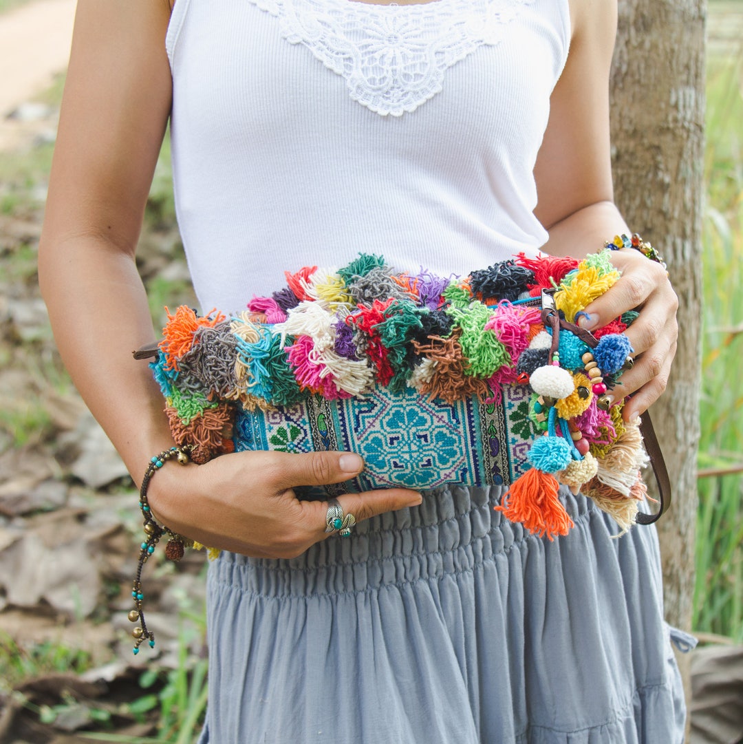 Pom pom clutch bag sale