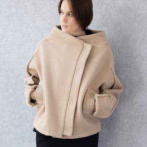 Cappotto in lana di cammello, giacca invernale corta, cappotto da donna, collo a imbuto, tasche, chiusura con bottoni