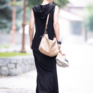 Side view highlighting relaxed cut and hood