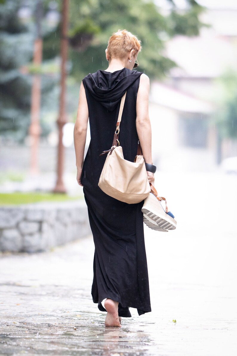 Side view highlighting relaxed cut and hood