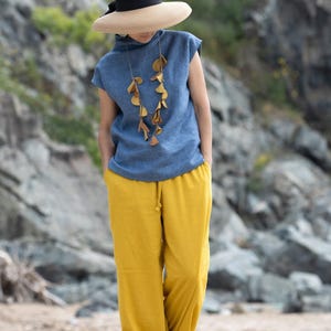 Folded blouse showcasing fabric and finishing