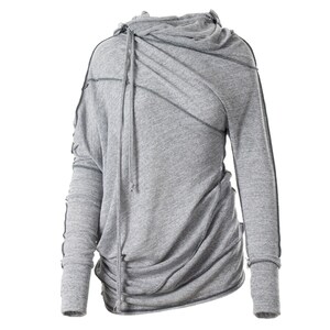 May include: Gray hooded sweatshirt with a draped cowl neck and long sleeves. The sweatshirt has a relaxed fit and a distressed look.