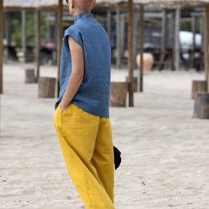 Side view showing relaxed fit and subtle silhouette