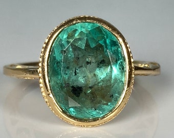 GIA 7ct Columbian Emerald Ring in 18K Yellow Gold
