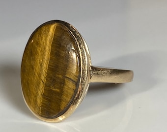 Art Deco-ring med honungstigeröga i 10 karat gult