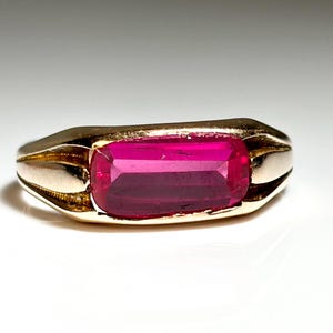 Ostby Barton Maltese Cross Flat Cut Ruby East West Ring in 10K Yellow Gold