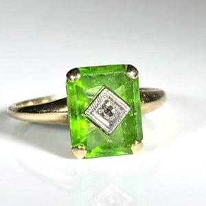 May include: A set of three ceramic mugs with a speckled, matte finish. The mugs are in shades of cream, light gray, and dark gray. Each mug has a simple, minimalist design, perfect for coffee or tea.