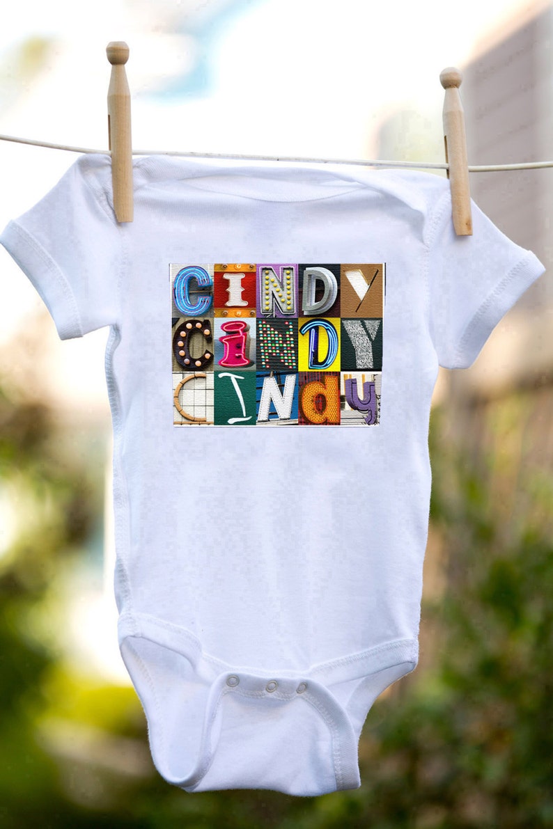 Personalized baby bodysuit featuring the name CINDY showcased in photos of letters from actual signs; Baby gift; Baby shower