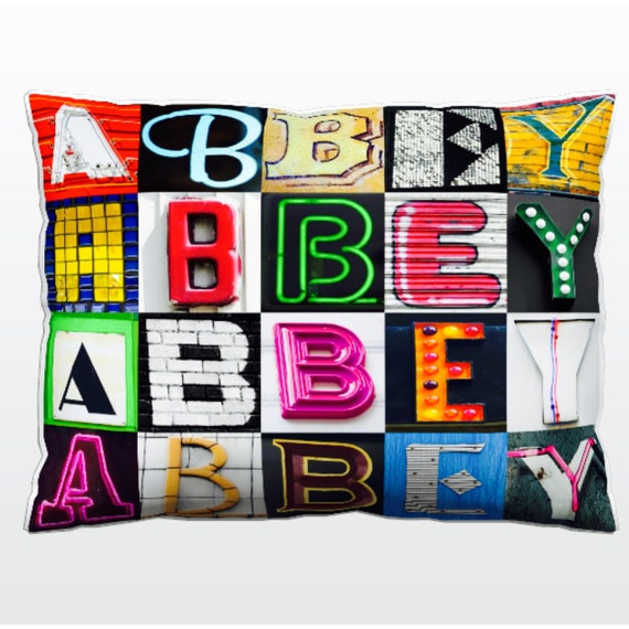 Personalized Pillow featuring ABBEY in photos of sign letters