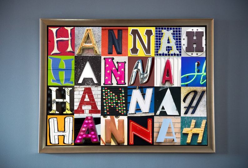 May include: A framed artwork featuring the name "HANNAH" spelled out in colorful, patterned letters. Each letter is made from a different material, such as metal, wood, or plastic, and has a unique design.