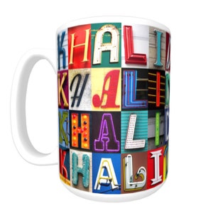 May include: White ceramic mug with a colorful design of the name "Khalil" spelled out in various fonts and colors. The letters are made of different materials, including neon signs, painted wood, and metal.