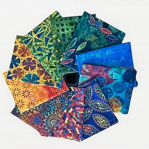 May include: A collection of 10 fabric squares with various colorful patterns, including geometric shapes, floral designs, and abstract patterns. The fabric squares are arranged in a circular pattern.